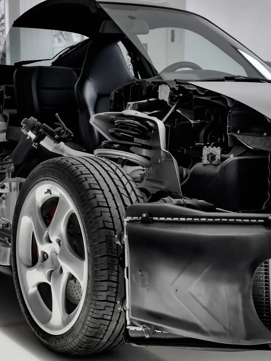 Car with the bonnet open in a workshop — European repair in Trinidad