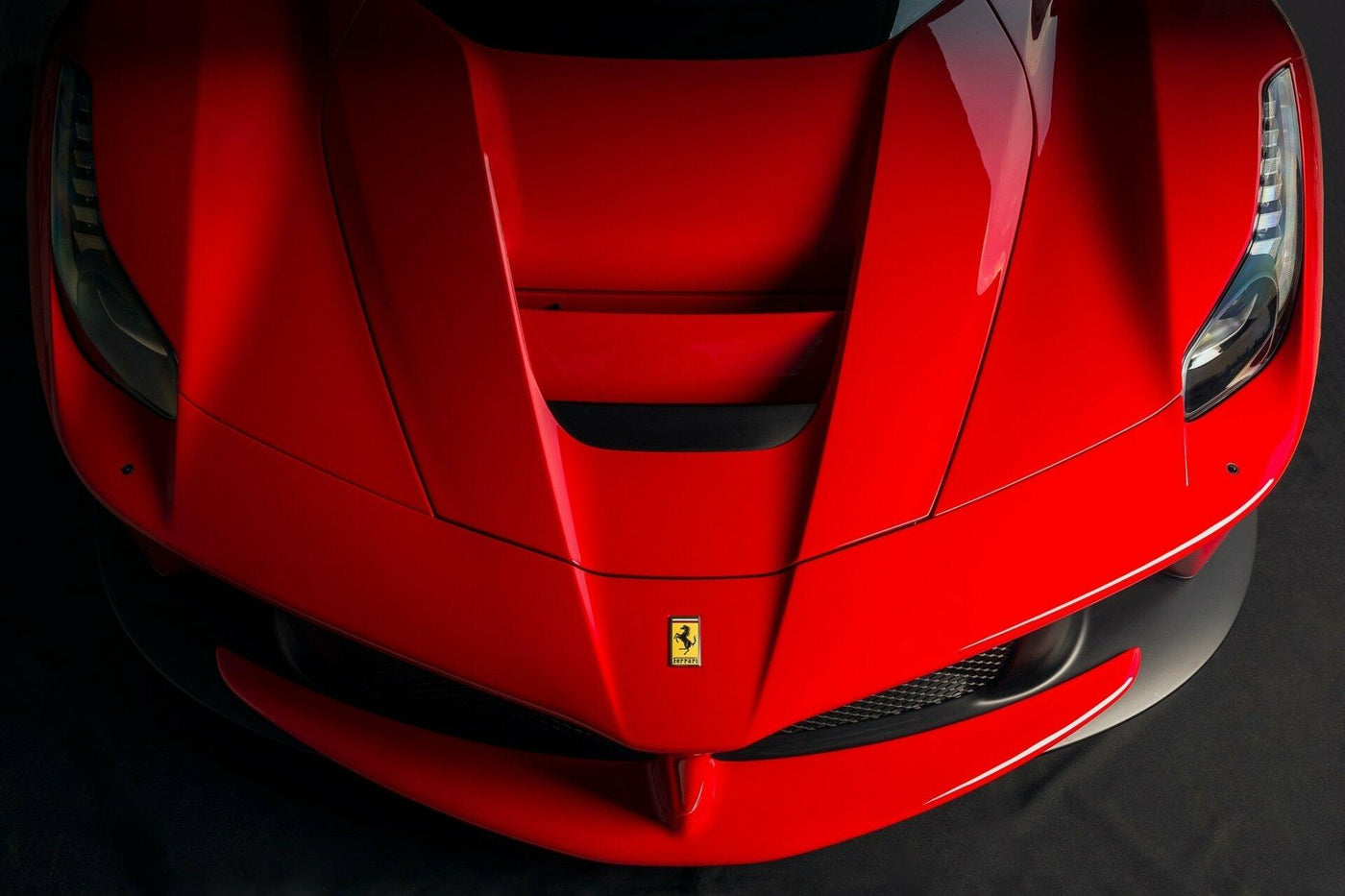 Red Ferrari bonnet and front detail