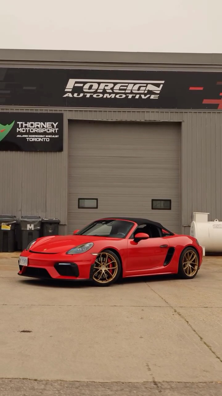 Red Porsche Boxster Spyder outside the Foreign Automotive workshop in Canada