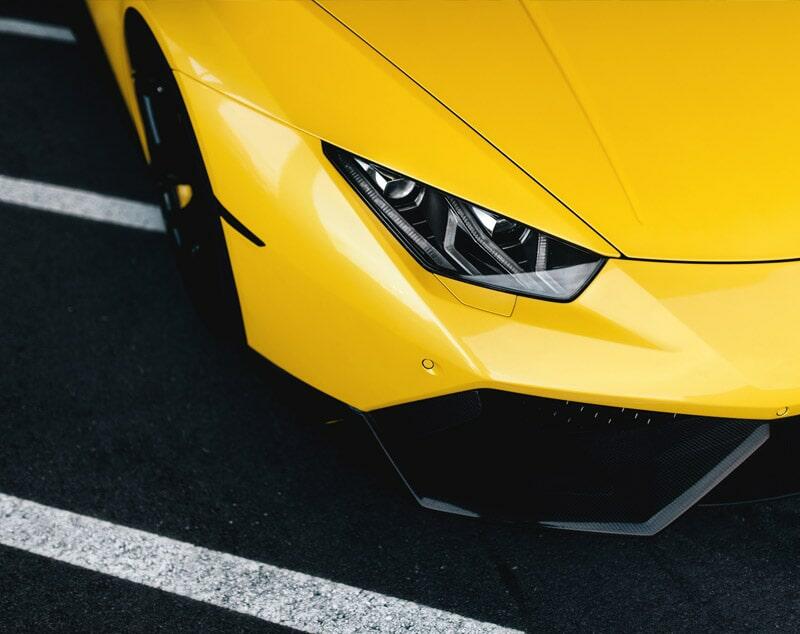 Yellow Lamborghini front and headlight detail