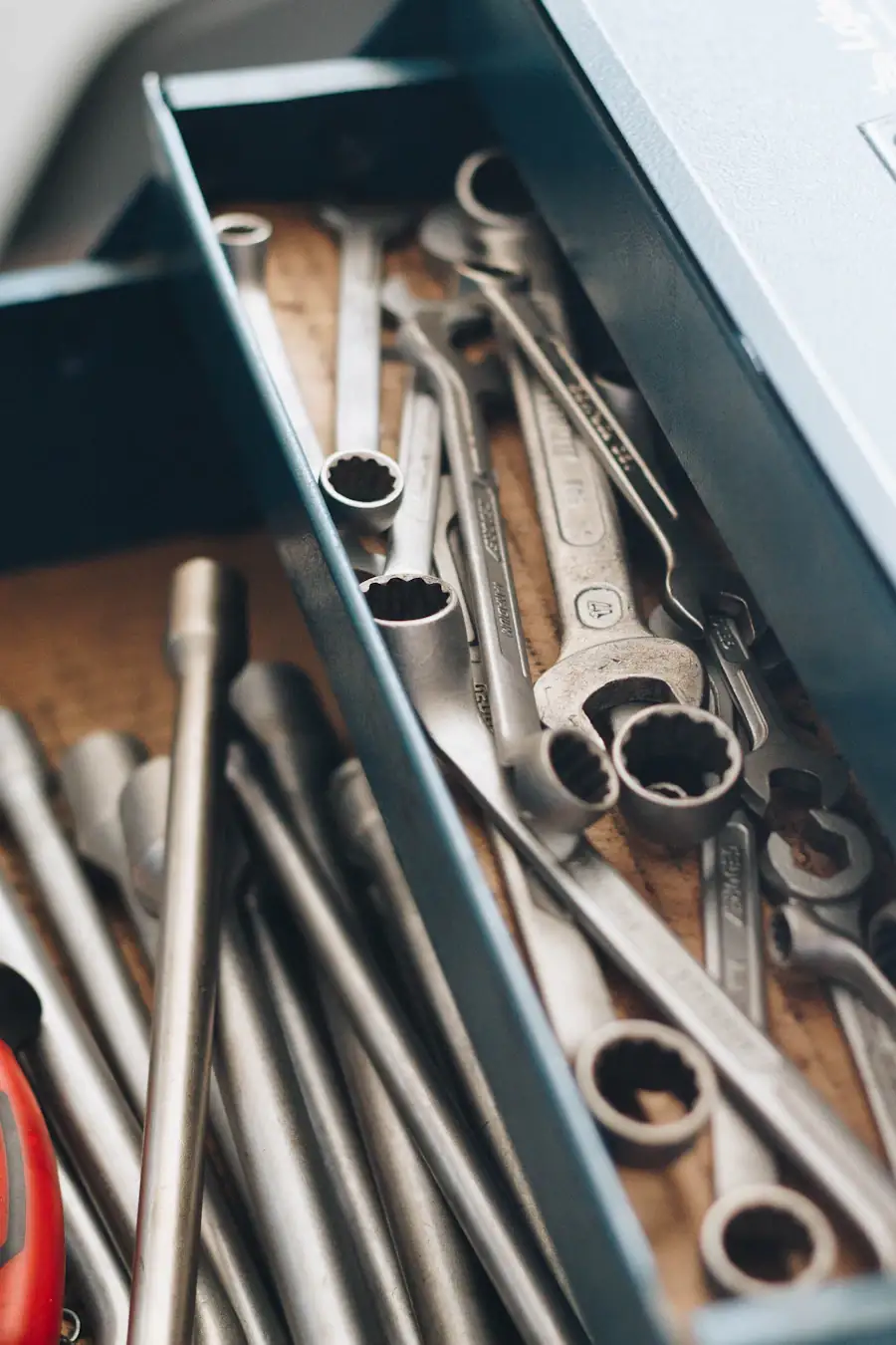 Workshop tools laid out in a box — correct parts and correct tooling